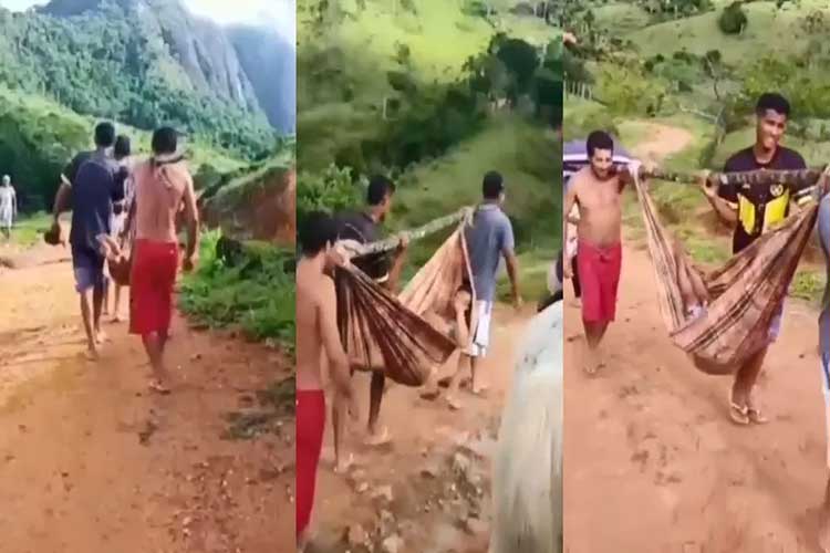 Guaratinga: Paciente é carregada em rede após ambulância não conseguir passar em estrada