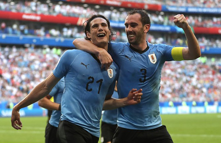 Uruguai freia empolgação russa, faz 3 a 0 e termina como líder do Grupo A